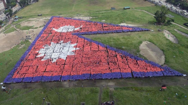 35,000 Nepalis congregate in Tundikhel for largest human flag